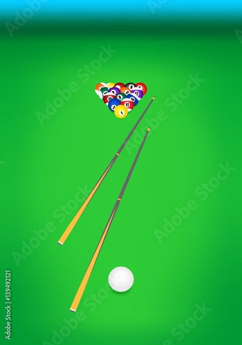 Front view of the billiard table with green cloth with two wooden cues with billiard balls with numbers at the back and with the cue white ball in front 