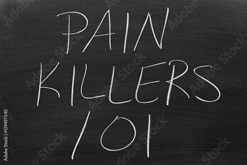 The words "Pain Killers 101" on a blackboard in chalk