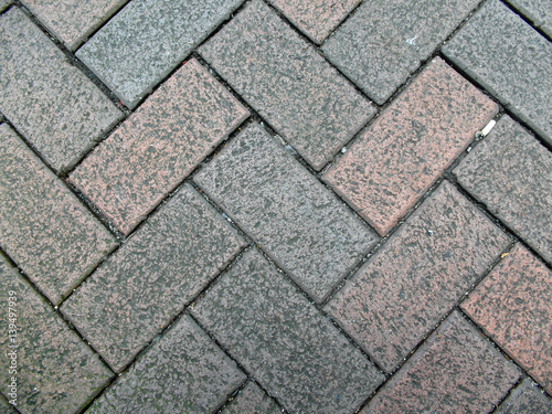 Brick pavement patterns on the ground.