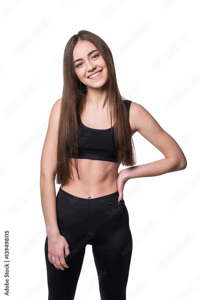 Young smiling fitness-girl in sport style isolated on white background. Healthy lifestyle concept. Young smiling fitness-girl in sport style isolated on white background. Healthy lifestyle concept.