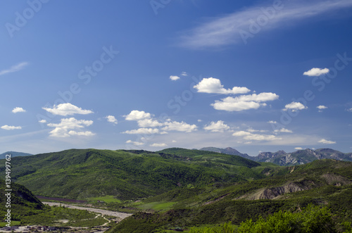 Green meadow in mountain. Composition of nature. Beautiful landscape of Big Caucasus spring view of nature. Spring in Azerbaijan. Shamakhi Ismailli