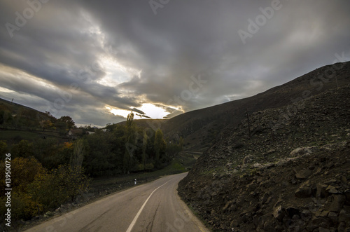 Cycling mountain road. Misty mountain road in high mountains. Cloudy sky with mountain road. Azerbaijan Talish Mountains