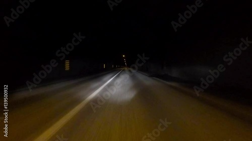 Car driving through a tunnel in the Faroe Islands 