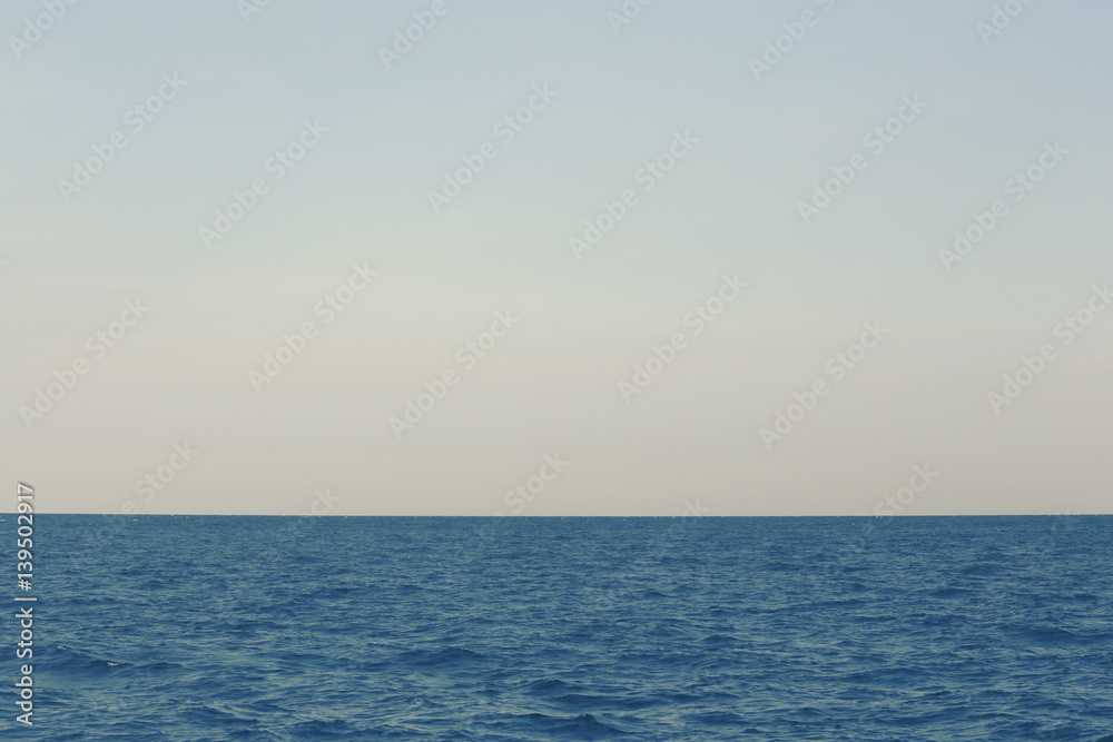 Sea wave and blue sky background.