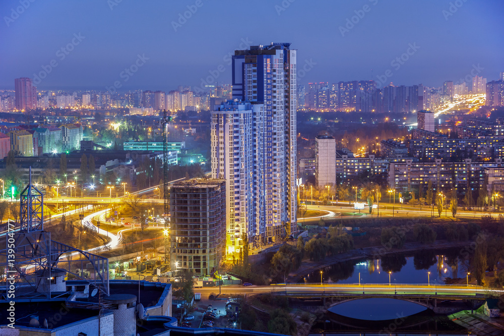 Night Kiev city view, panorama of construction bulding Kiev, rusanovka, Ukraine