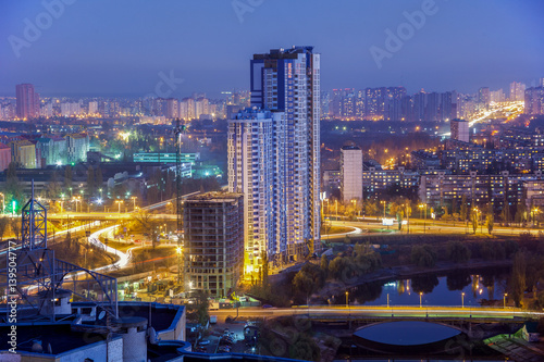 Night Kiev city view, panorama of construction bulding Kiev, rusanovka, Ukraine