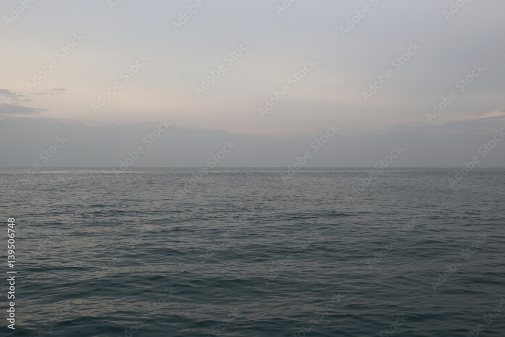 Sea or ocean and evening sky.