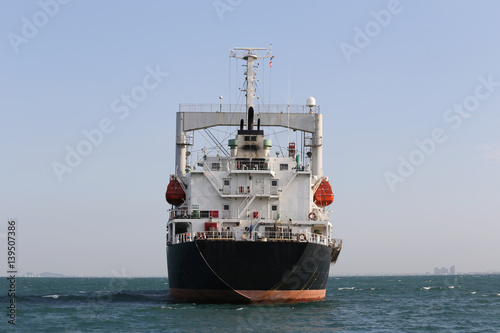 Marine cargo ship in sea.