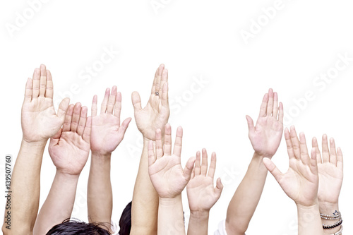 group of people with hands up