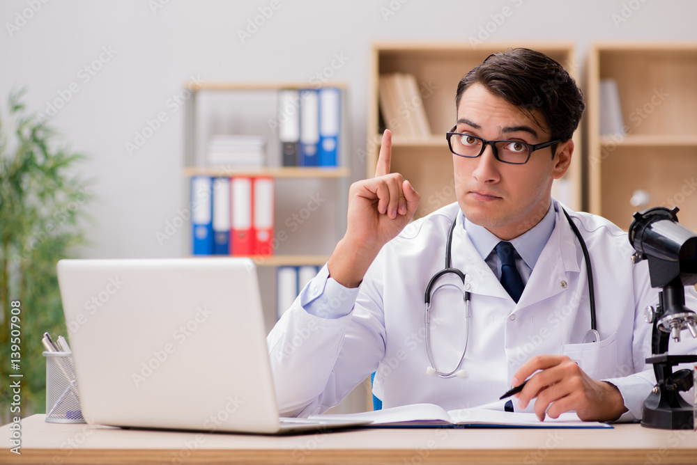 Young adult doctor working in the hospital Young adult doctor working in the hospital