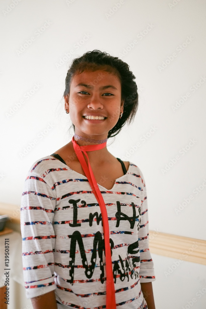 Young natural beautiful tan asian girl smiling Young natural beautiful tan asian girl smiling