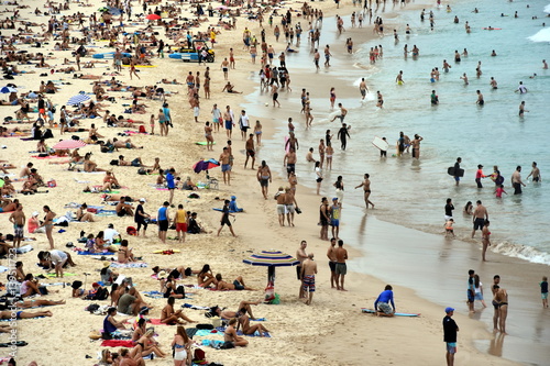 Sydney, Australia - Feb 5, 2017. People relaxing, swimming and sun bathing on Bondi beach. Bondi beach is one of the most famous tourist sites in Australia.