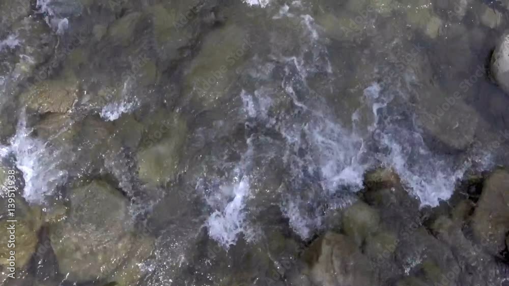 Mountain creek water flowing rapidly river cascade Mountain creek water flowing rapidly river cascade