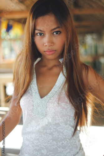 Sexy portrait of a beautiful Asain girl on summer vacation