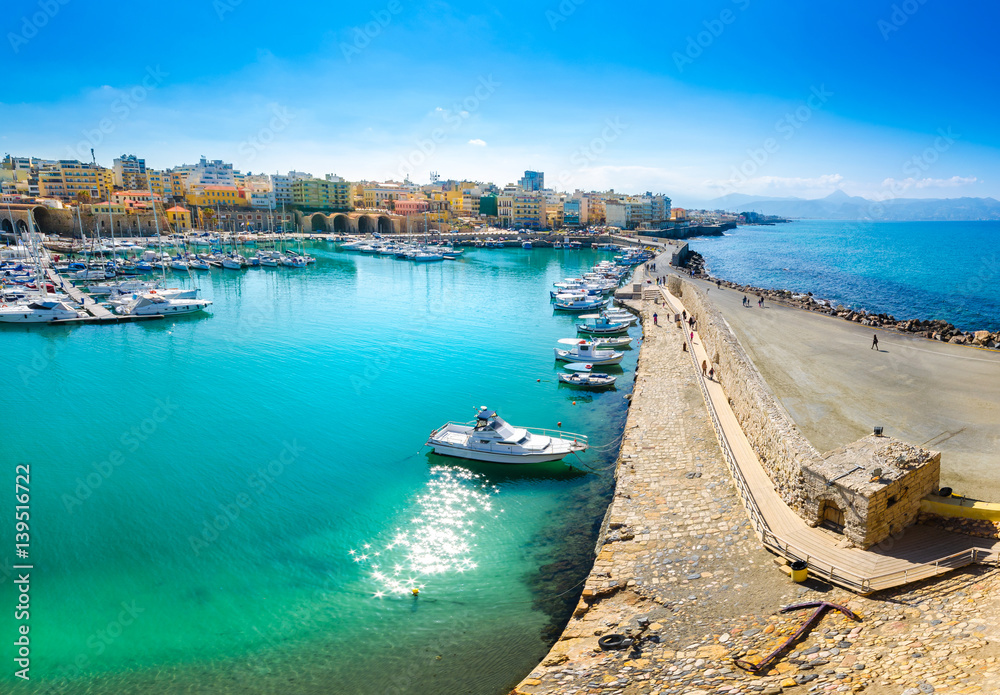 Heraklion port with old venetian fort Koule and venetian shipyards, Crete, Greece