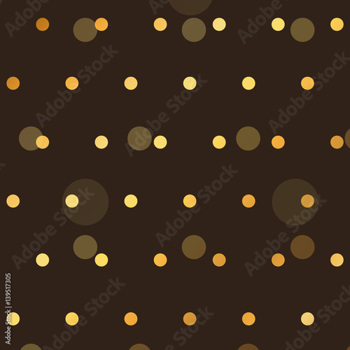 brown background with golden polka style dots