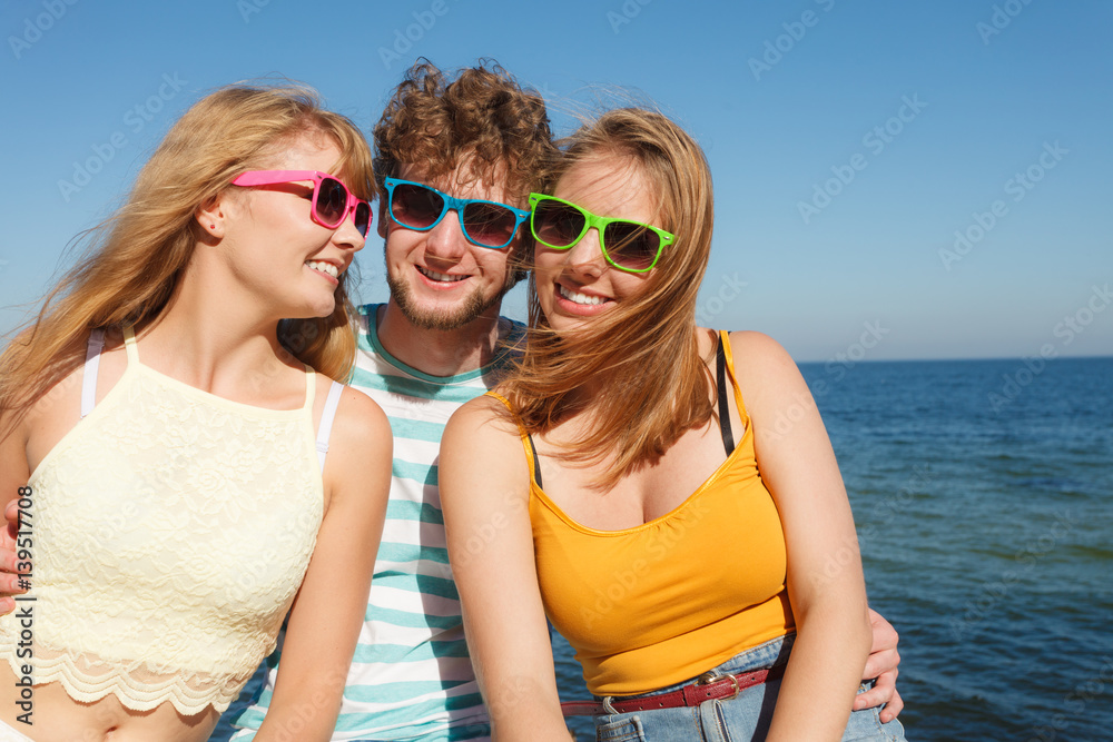 Group friends boy two girls having fun outdoor Group friends boy two girls having fun outdoor
