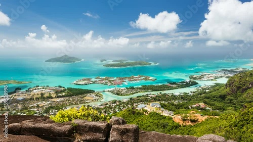 Timelapse sequence from Mount Copolia in Mahe, Seychelles with view to the coast and some islands. photo