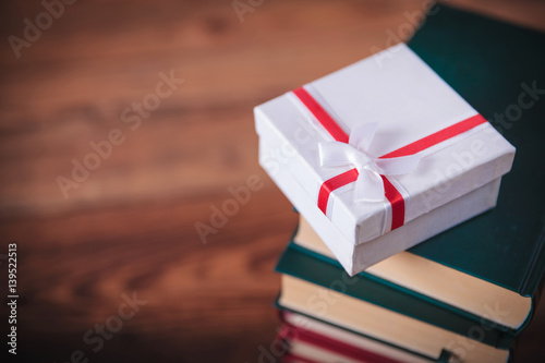 little present box on top  of books © Viorel Sima