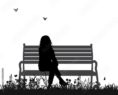  isolated silhouette of a girl sitting on a bench in the Park
