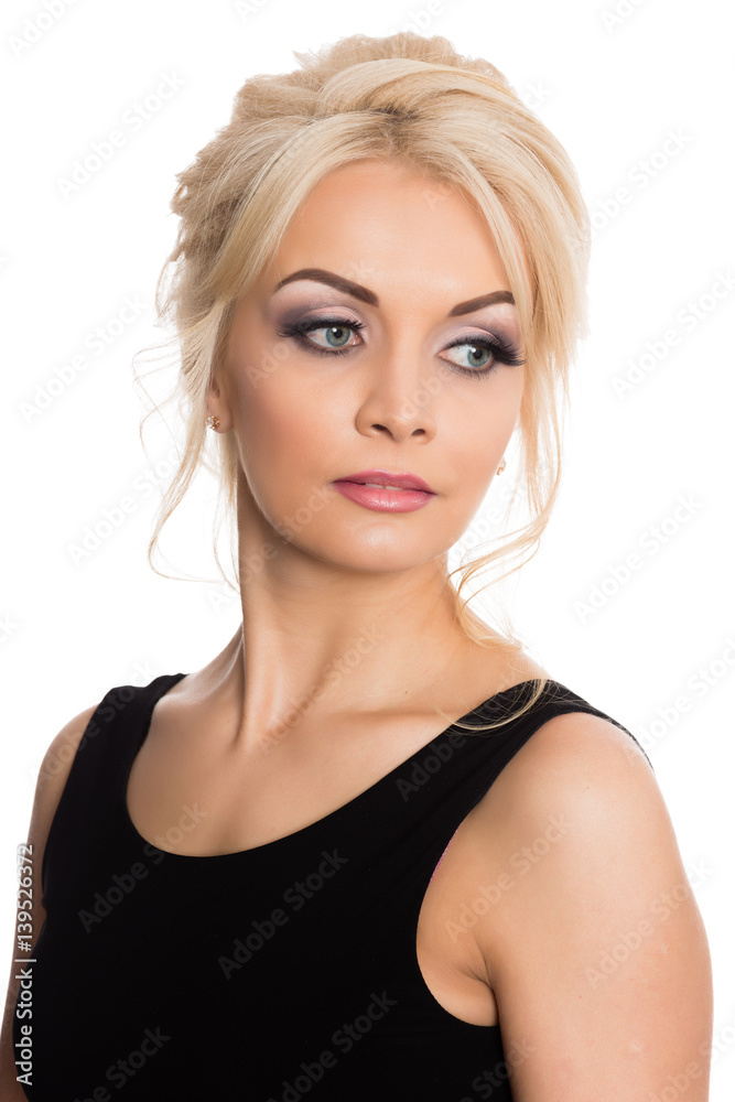 Portrait of a beautiful young blonde in a black dress Portrait of a beautiful young blonde in a black dress