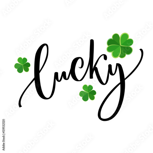 Lucky word - St. Patrick's day lettering for t-shirts and cards. Brush calligraphy design with shamrock