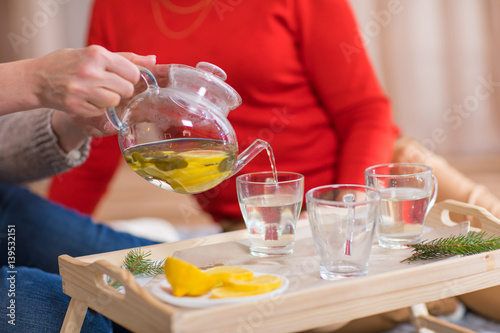 Woman pouring tea