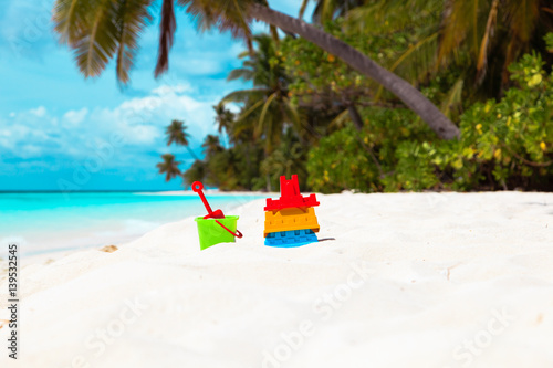 Wallpaper Mural kid toys on tropical sand beach Torontodigital.ca