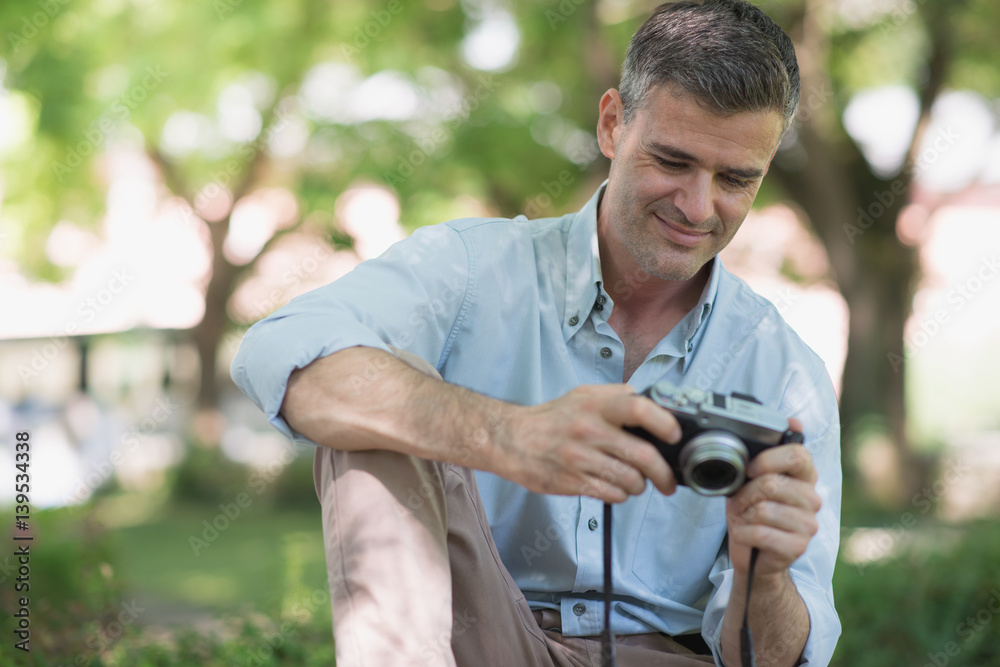 Photographer at the park Photographer at the park