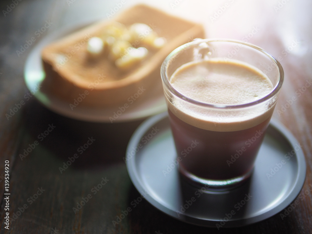 Hot coffee and bread in holiday morning.