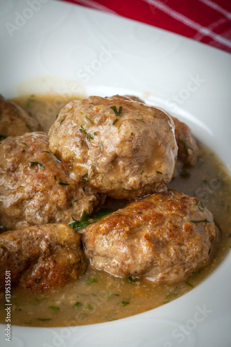 Pork meatballs with dill sauce.