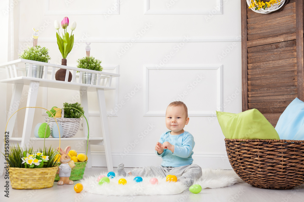 Easter egg hunt. Adorable child playing with Easter eggs at home Easter egg hunt. Adorable child playing with Easter eggs at home