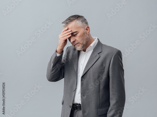 Businessman with headache