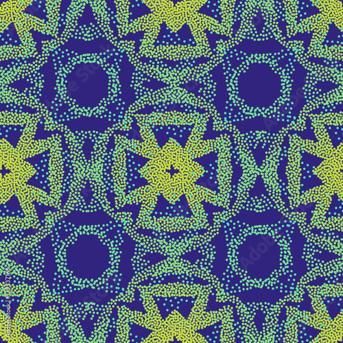 Seamless violet and light green ethnic pattern made of dots. A pockmarked background of geometric shapes and stylized plant elements.