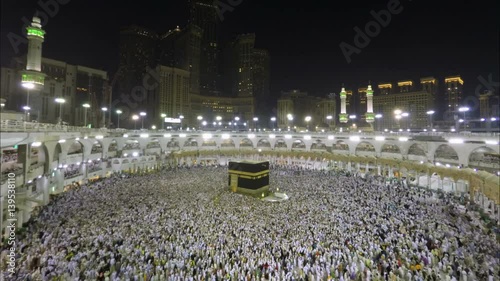 Time lapse video of Muslim pilgrims circling around the holy Kaaba at night during Hajj inside al Masjid al Haram in Mecca, Saudi Arabia.