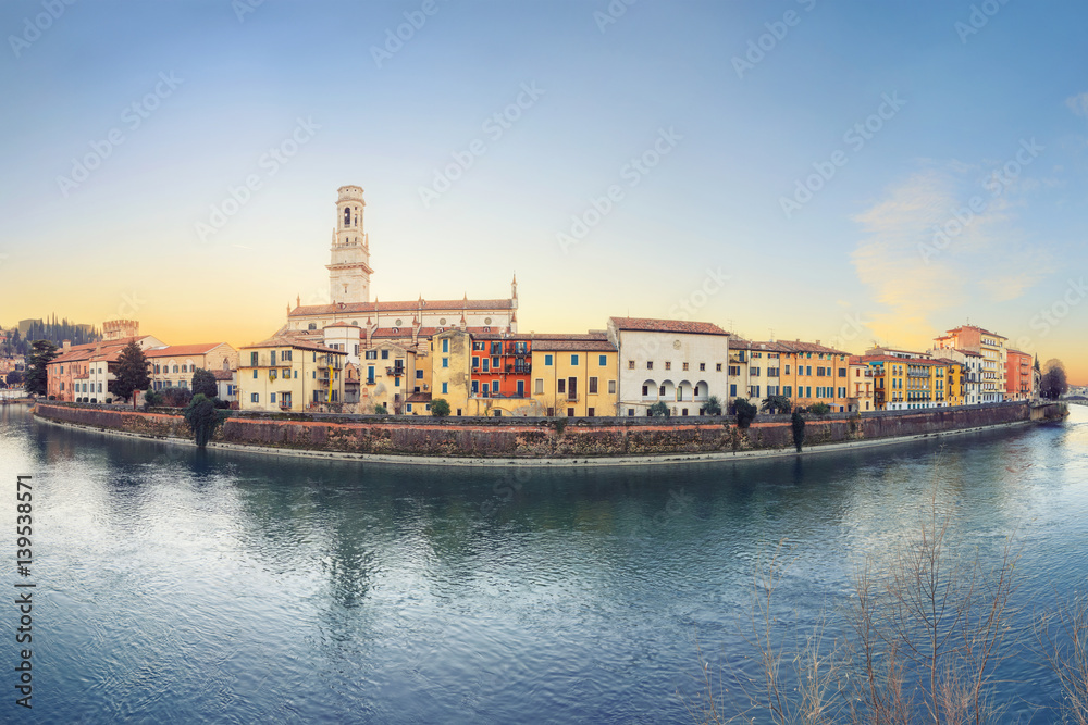 historical quarter of Verona, panorama from river on Duomo Cathedral at sunrise