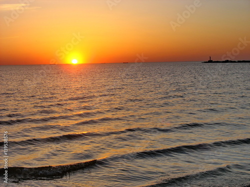 Sunset on the shore of the Gulf of Riga