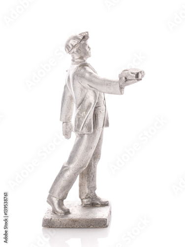 Figure miner who holds coal in his hand
