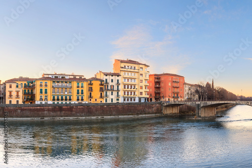 historical quarter of Verona, panorama from river on Duomo Cathedral at sunrise © lena_serditova