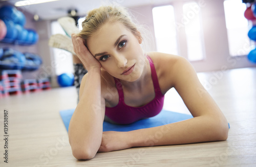 Blond woman hair resting after workout .