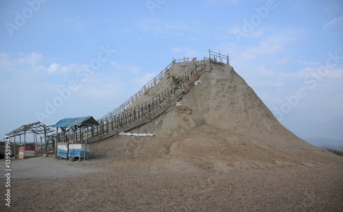 Mud volcano on a blue sky day near Cartagena in Colombia