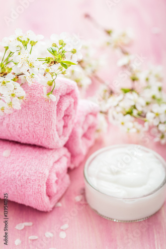 Rolled pink towel with flowers
