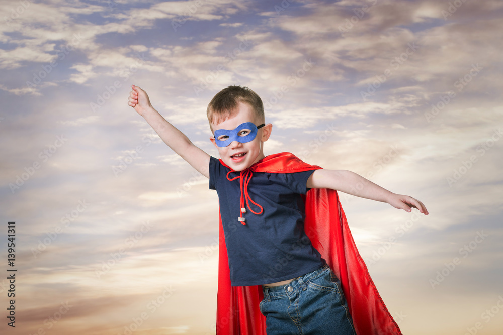 A boy in a Superman costume A boy in a Superman costume