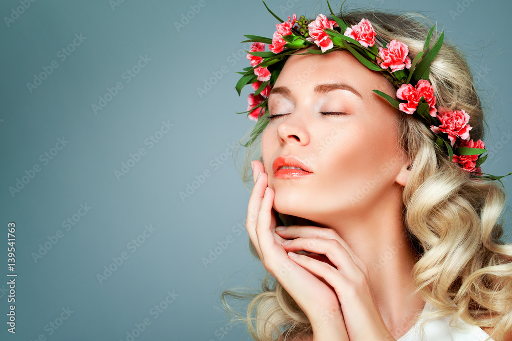 Healthy Model Woman with Natural Make up, Blonde Curly Hair and Summer Flowers Wreath