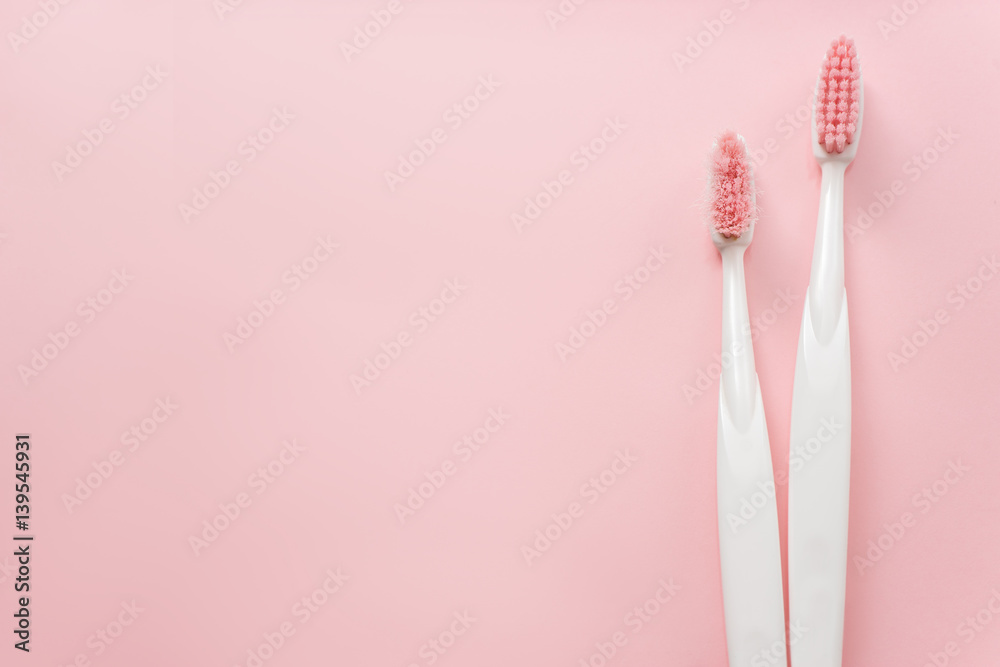 New and used toothbrush on a white background New and used toothbrush on a white background