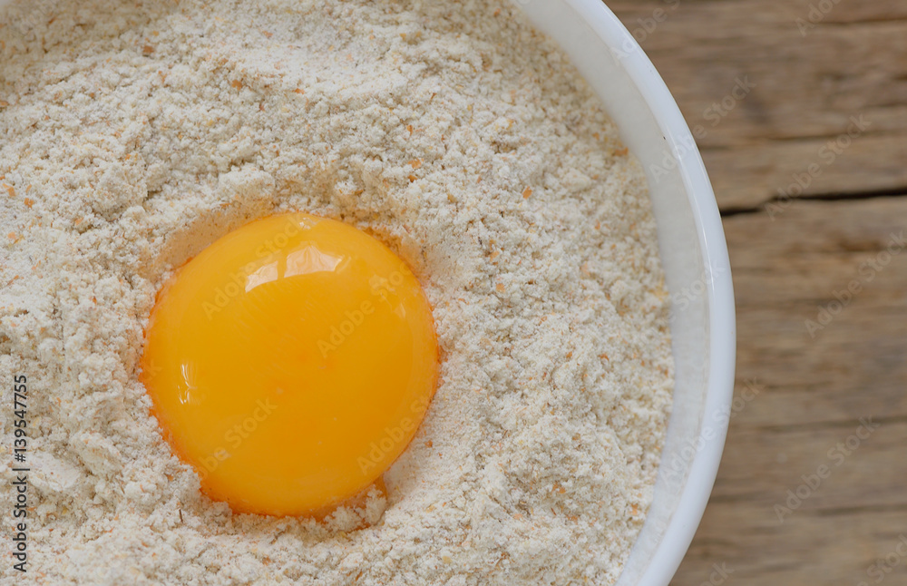 Flour and egg ready for mixing Flour and egg ready for mixing