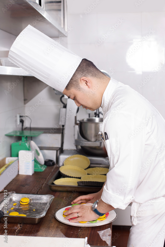 young man chelf makes food in kitchen young man chelf makes food in kitchen