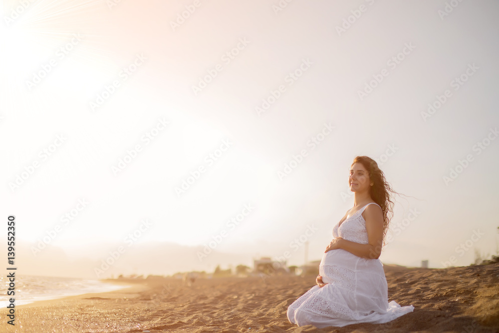custom made wallpaper toronto digitalYoung pregnant woman walking on the beach 