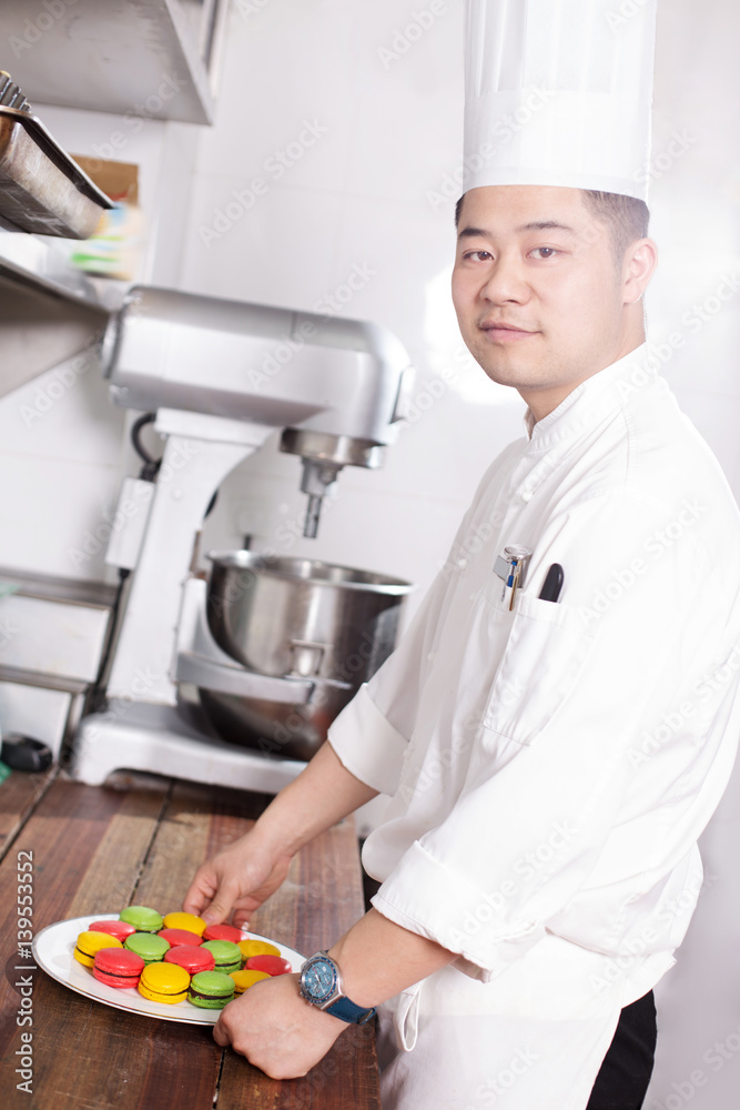 young man chelf makes food in kitchen young man chelf makes food in kitchen