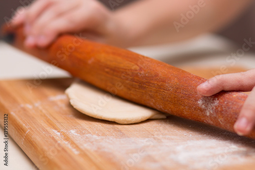 Cooking of the dough. Buns with sausage.